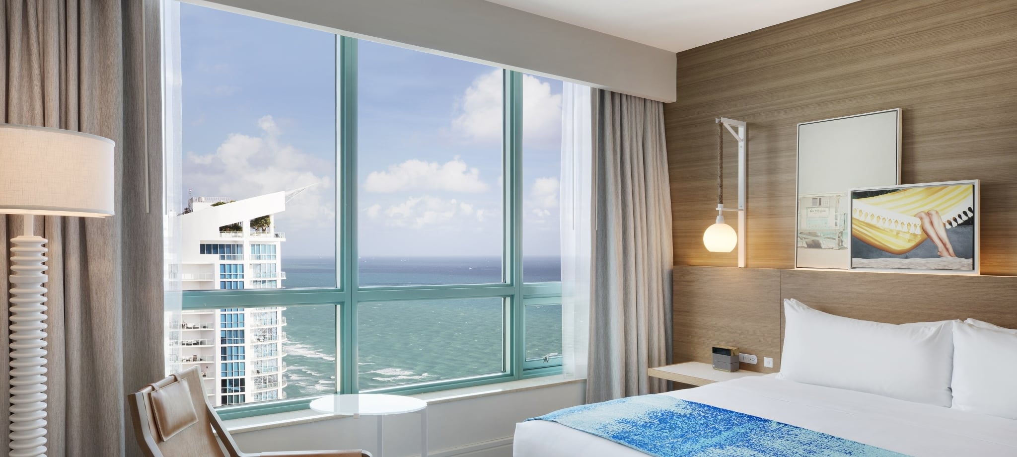 Diplomat Suite Bedroom with views of the ocean and surrounding resort